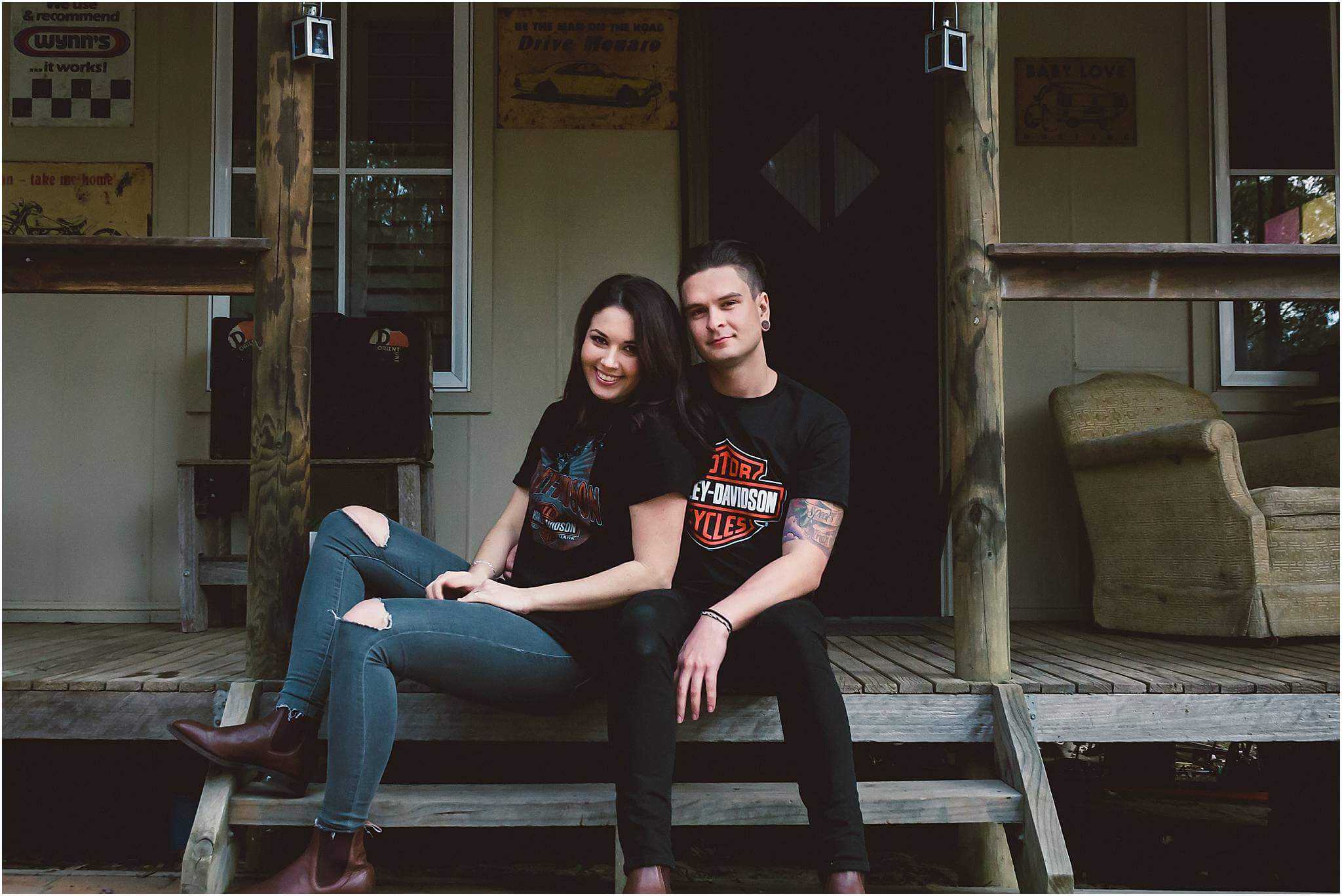 rustic country engagement first home lifestyle session harley davidson in Australia couple sitting on the stairs - London southwestern ontario wedding and engagement photographer - Dylan Martin Photography